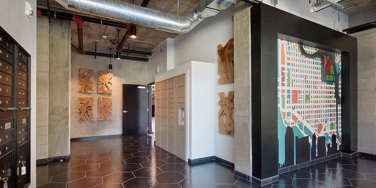 Parcel Pending by Quadient smart lockers in the lobby of Wakeland Housing & Development's The Beacon, an affordable housing property in downtown San Diego, California